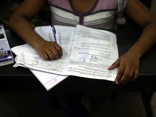 A student studies in a classroom at the Bansal Classes in Kota